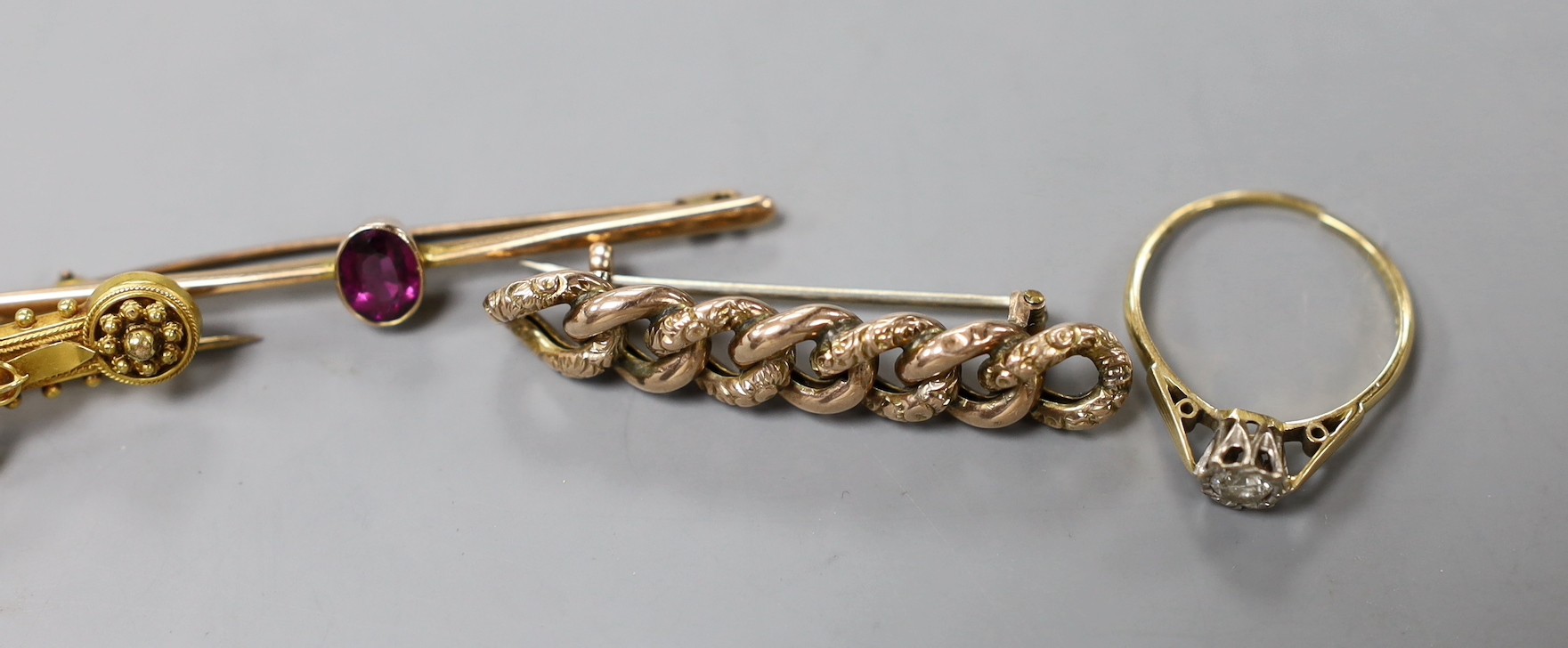 Two early 20th century 9ct and gem set bar brooches, gross weight 4.7 grams, a similar 15ct horseshoe bar brooch, gross 3.4 grams, two other yellow metal and gem set bar brooches, gross 10 grams, a 22ct gold and white op